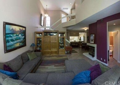 Large living room with high ceilings and plenty of