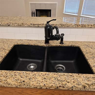 Modern kitchen sink with a double basin, set in a