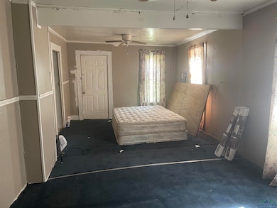 Bedroom featuring crown molding