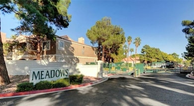 Community sign with a gate