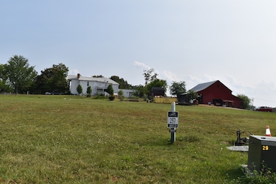 Backing up to the beautiful old home that is not part of the community.