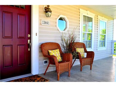 Exterior Front. Warm & Welcoming Covered Front Por