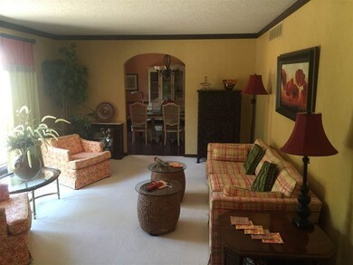 Bright formal Living Room adjoins the formal Dinin