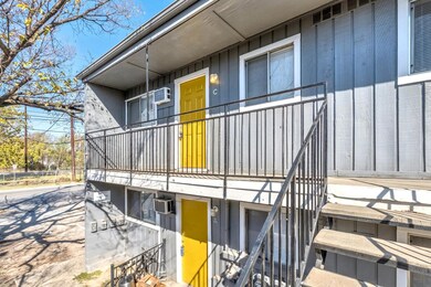 Entrance to property featuring a wall mounted AC 