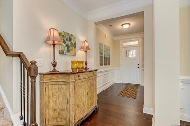 As you enter the home, the open foyer provides vie