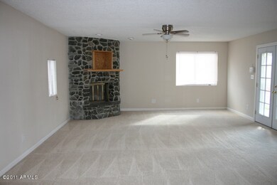 FAMILY ROOM WITH FIELDSTONE FIREPLACE