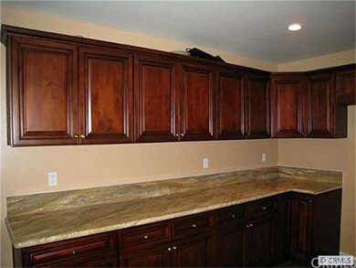 oak cabinet in large kitchen