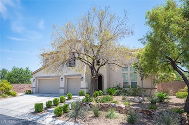 View of front of property featuring concrete drive