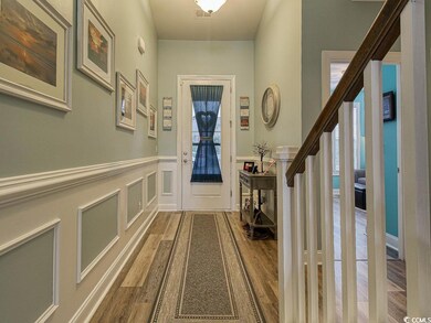 Entryway featuring wood-type flooring