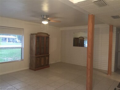 3 BR Unit - Living-Dining  Large 11X20 room w/large windows and great white brick wall.