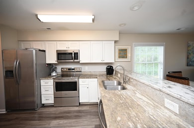 Kitchen featuring appliances with stainless steel 