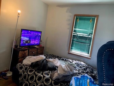 Bedroom featuring oil tank