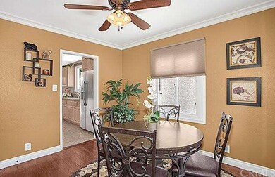 Formal Dining Room with Rich Colored Hardwood Floo