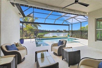 View of swimming pool featuring a patio, a lanai, 