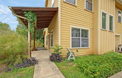 View of side of property with board and batten si