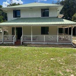 Side view with wrap around porch