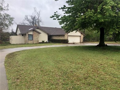 Circle drive with large front yard.