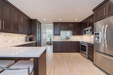 705 Neapolitan Way, Naples, FL 34103 - photo 4