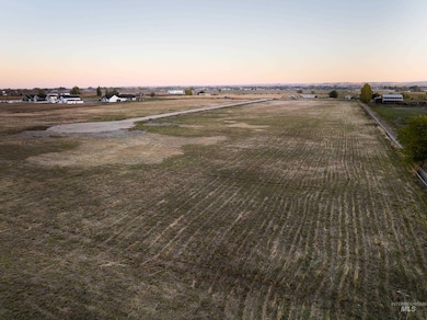 View of rural area featuring large plots for crops