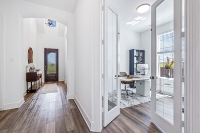 Off the entry is a guest bedroom-bath (toward the 