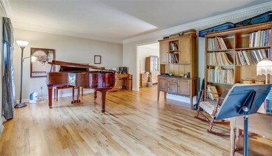Crown molding, hardwood floors and room to style t