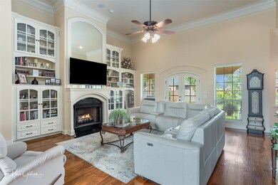 Living room with dark hardwood / wood-style floori