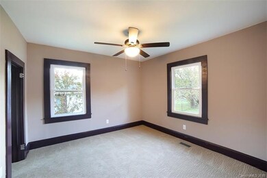 Back corner bedroom with new carpeting