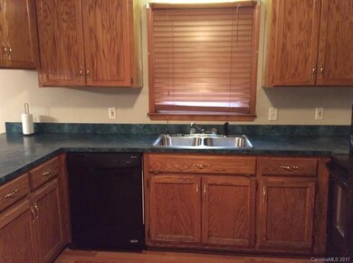 Kitchen cabinets, counter, sink and faucets new in