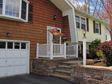 Exterior Front. Custom block stone work and new vi