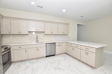 Kitchen featuring light tile patterned flooring, s