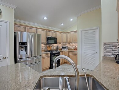 LOVELY QUARTZ COUNTER TOPS!  THE LOUVERED DOOR GOE