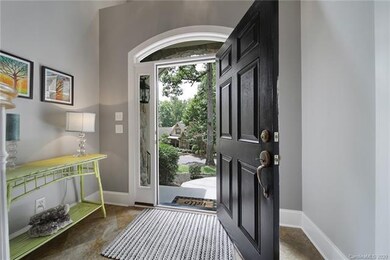 Front door leads into open living areas.