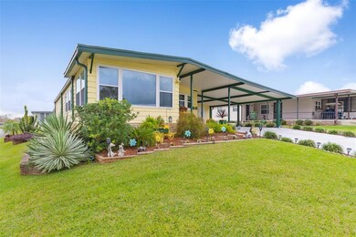 Located on corner lot, beautiful landscaping, and large windows in Florida Room.