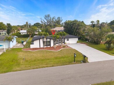 View of front of property featuring a front yard