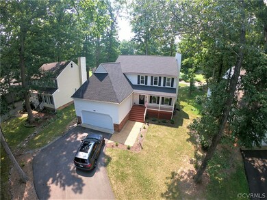 Paved Driveway & Lovely Front Yard