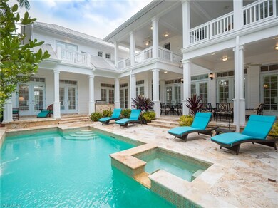 Pool & Spa with various seating & dining areas