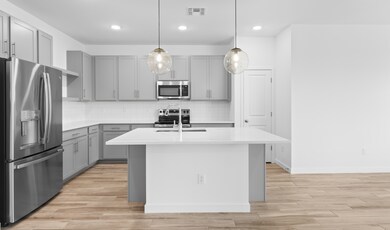 Kitchen with pendant lighting