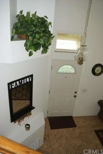 Front entry looking down from stairs. 