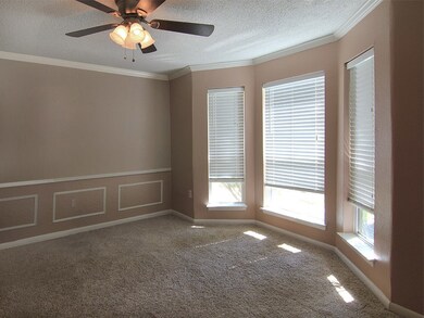 Formal dining room located at the front with view of the front yard, has access from the foyer and kitchen area.