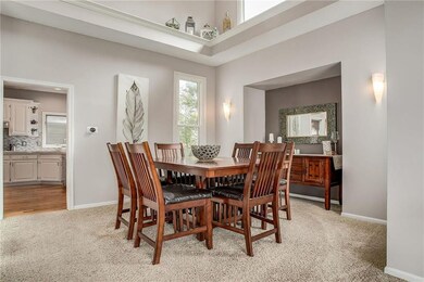 Open to the living room is the formal dining with 