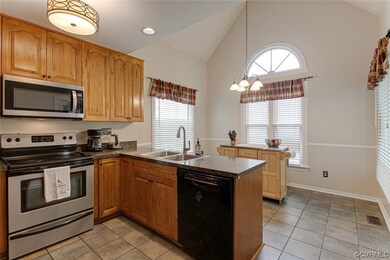 Kitchen featuring plenty of natural light, light t
