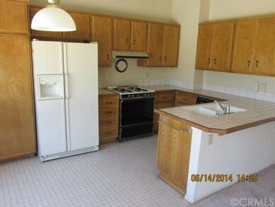 Very clean kitchen with all the appliances.