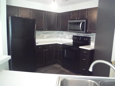 nice kitchen with some newer nice tile back splash