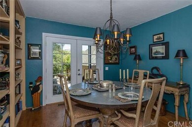 Formal dining room with French doors to outdoor li