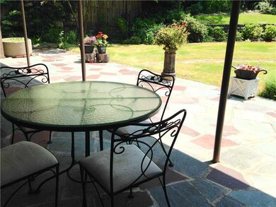 Patio/Deck. SPACIOUS COVERED STONE PATIO