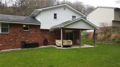 Exterior rear with nice covered patio.