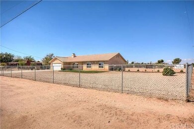 A spacious lot complete with open blue skies....