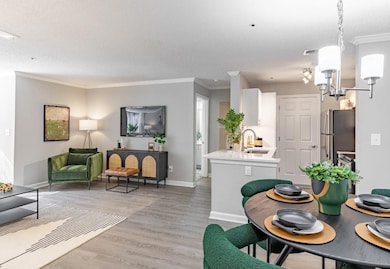 Living room featuring light hardwood / wood-style 