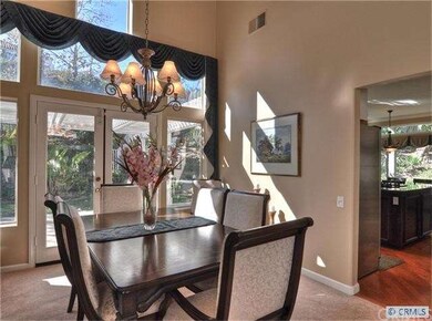 Dining Room with French Doors open to Kitchen
