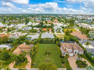 Gorgeous homes surround this twin palm lot ready f